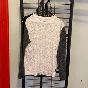 Black, grey, and white shirt.